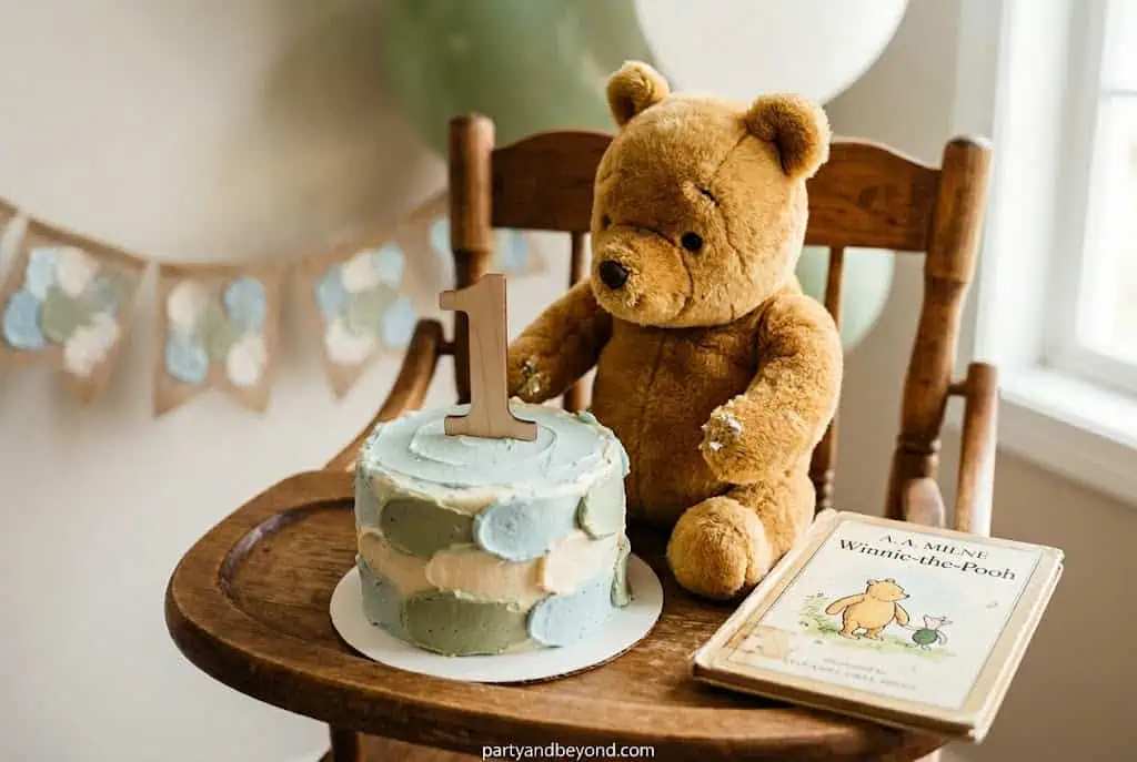 Winnie the Pooh themed first birthday with honey pots and yellow-red decor