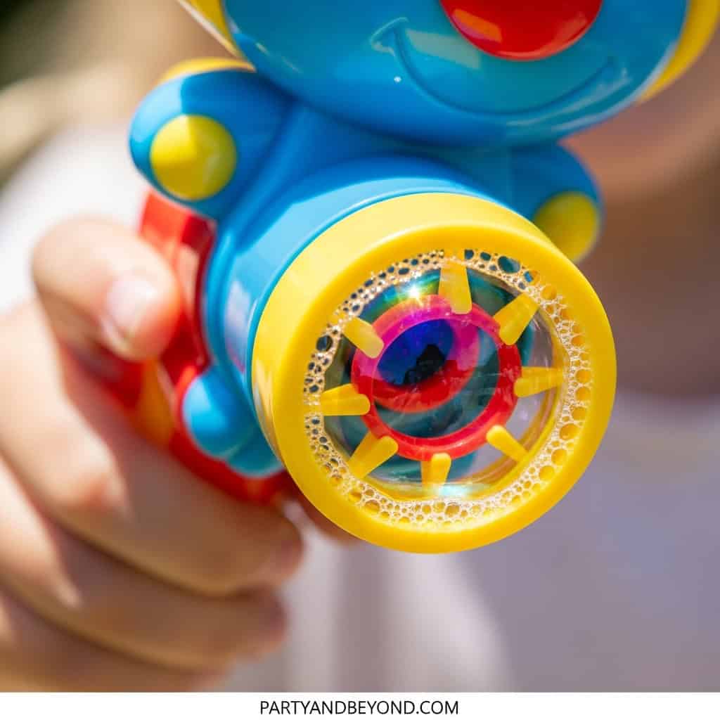 Colorful water gun toy for kids, perfect for party games and outdoor fun.