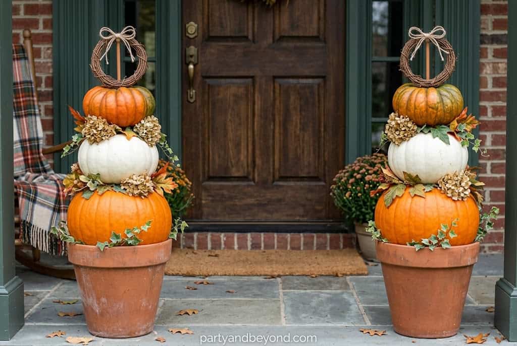 Stacked pumpkin topiary decoration for Halloween porch decor