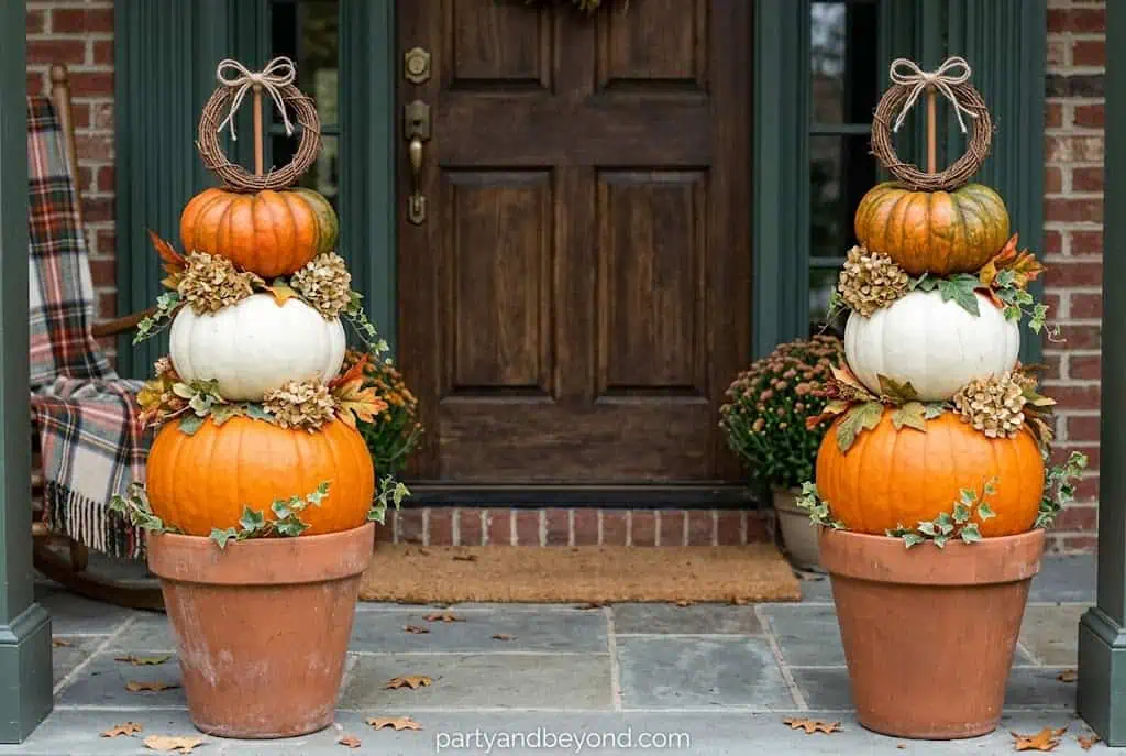 Stacked pumpkin topiary decoration for Halloween porch decor
