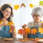 23 Fun and Easy Fall Crafts Ideas for Adults Autumn craft activity with two women creating fall leaf decorations for seasonal home decor.