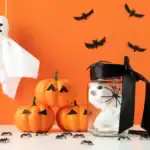 15 Indoor Halloween Decoration Ideas to Thrill and Chill Festive Halloween indoor decorations featuring pumpkins, ghost figures, and spooky accents for a thr.