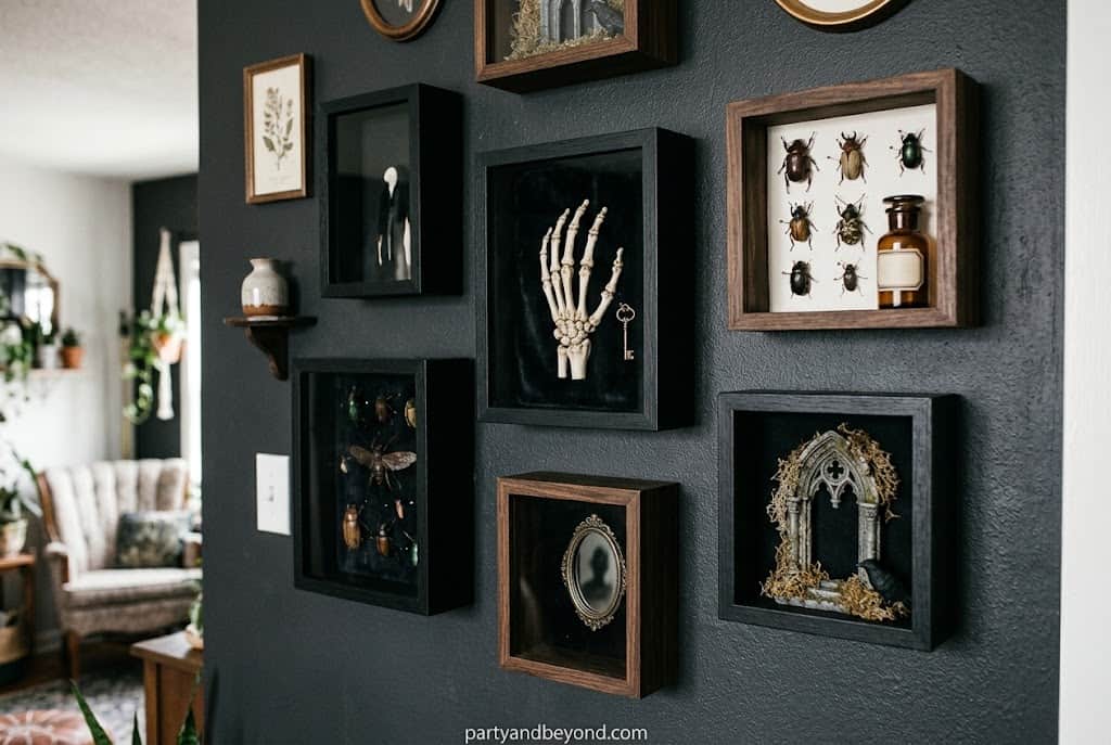Halloween shadow box wall art with haunted house and black cat silhouettes
