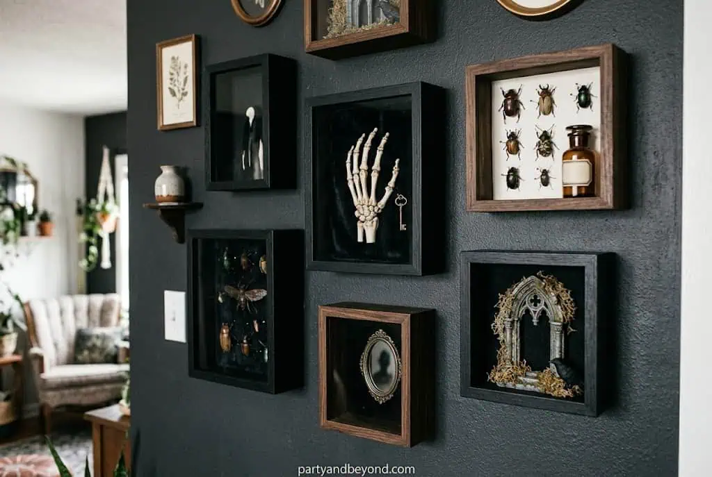 Halloween shadow box wall art with haunted house and black cat silhouettes
