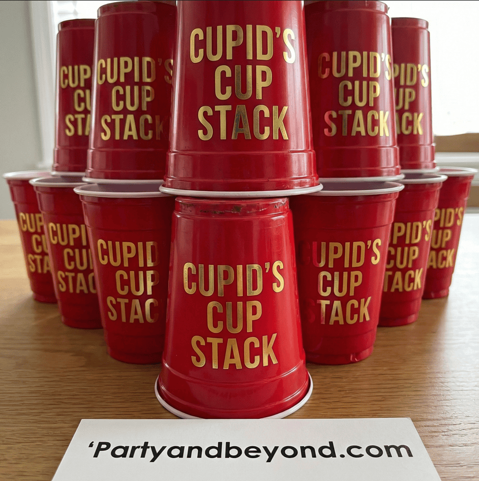 Red cups labeled "Cupid's Cup Stack" for a Valentine's Day game.