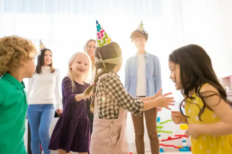 Children playing party games at a birthday celebration.