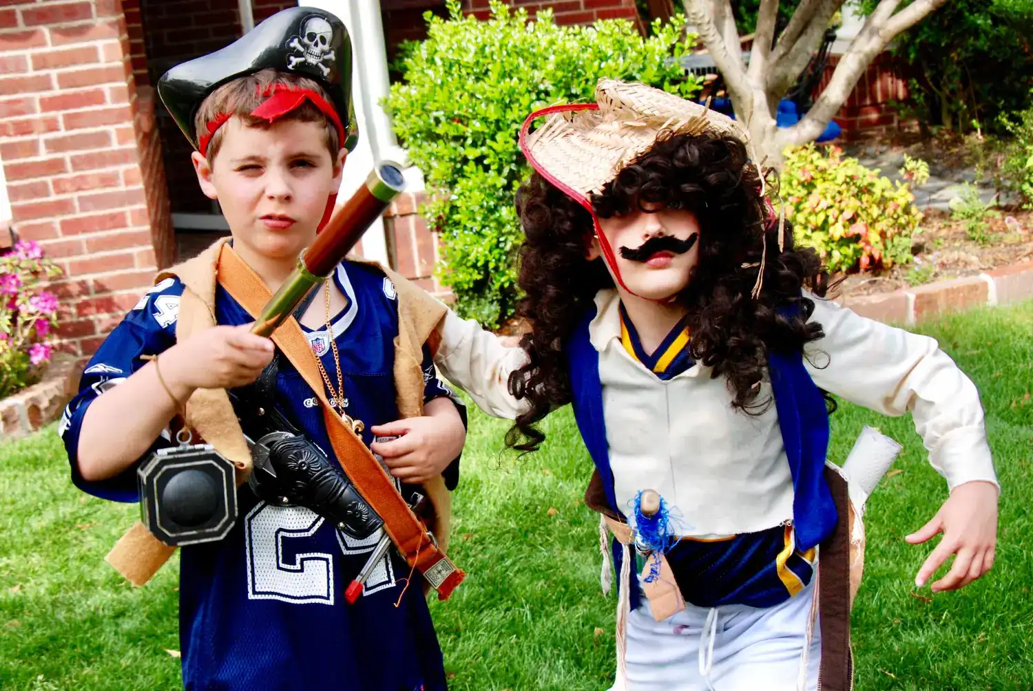 Children dressed as pirates for fun role-playing activities.