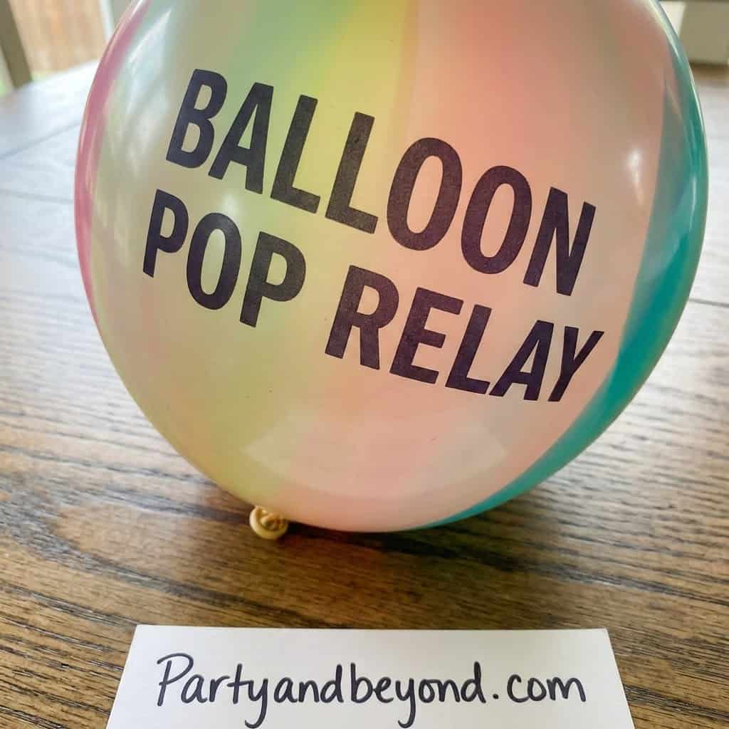 Colorful balloon with "Balloon Pop Relay" text for teen party game activity.
