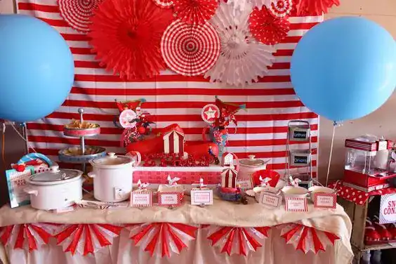 Vibrant birthday party dessert table with red, white, and blue decorations. Perfect for a stylish ce.