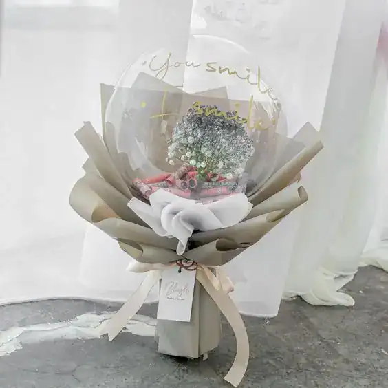 Decorative bouquet with folded dollar bills and flowers, perfect for teen gift ideas.