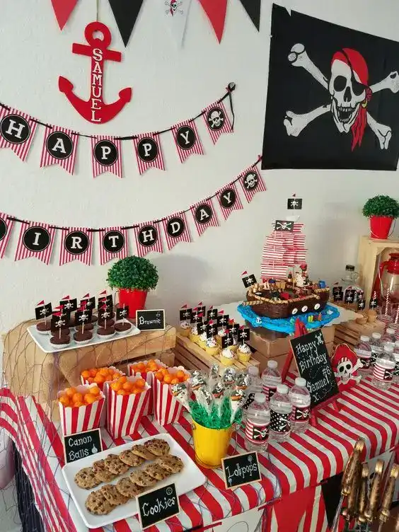 Vibrant pirate-themed birthday party decorations and treats setup.
