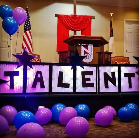 Talent Show Stage with Balloons and Decorations.