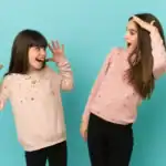 31 Twin Day Spirit Week Outfit Ideas for You and Your Bestie Two girls celebrating Twin Day in fun outfits for Spirit Week.