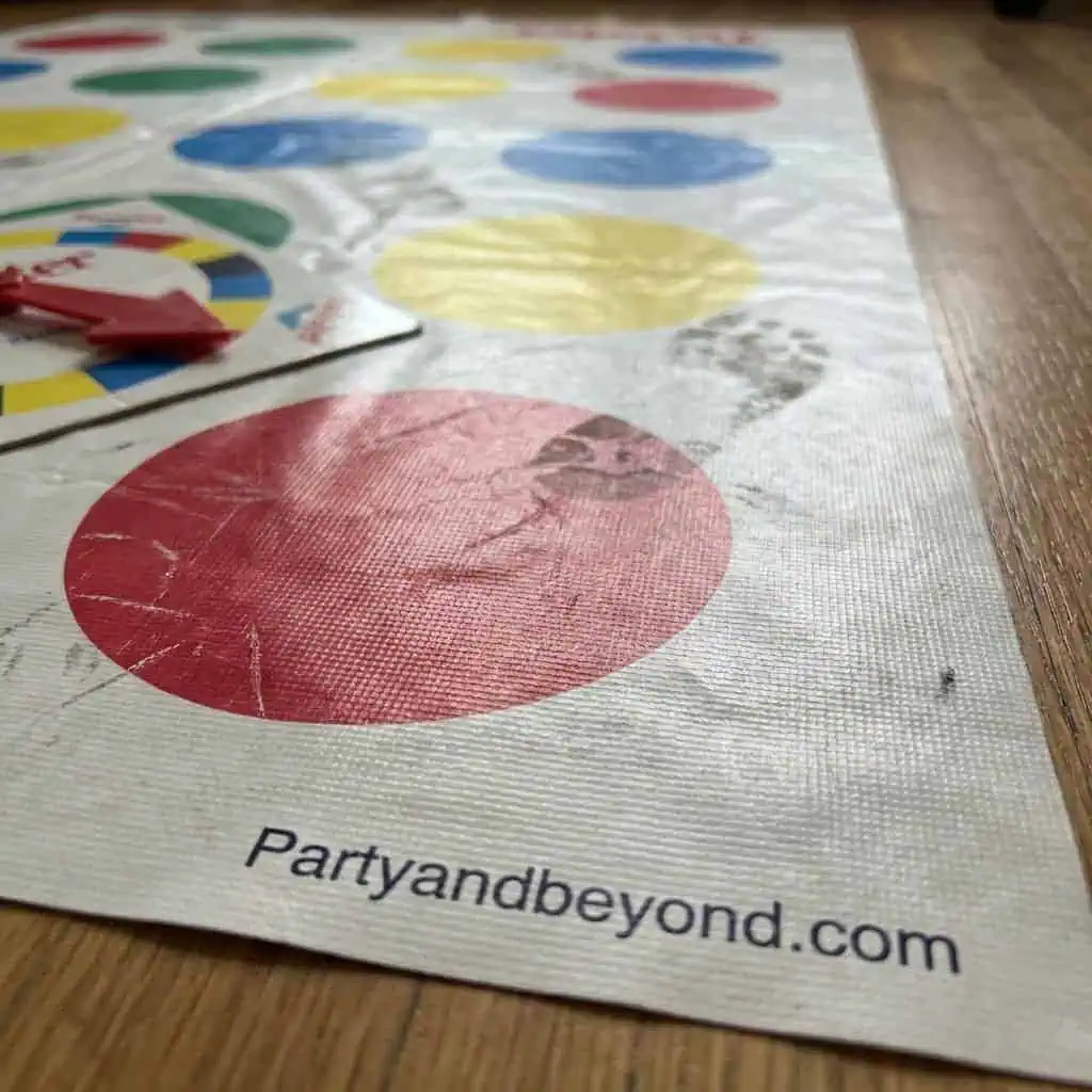Colorful Twister game mat for teen party games and fun activities.