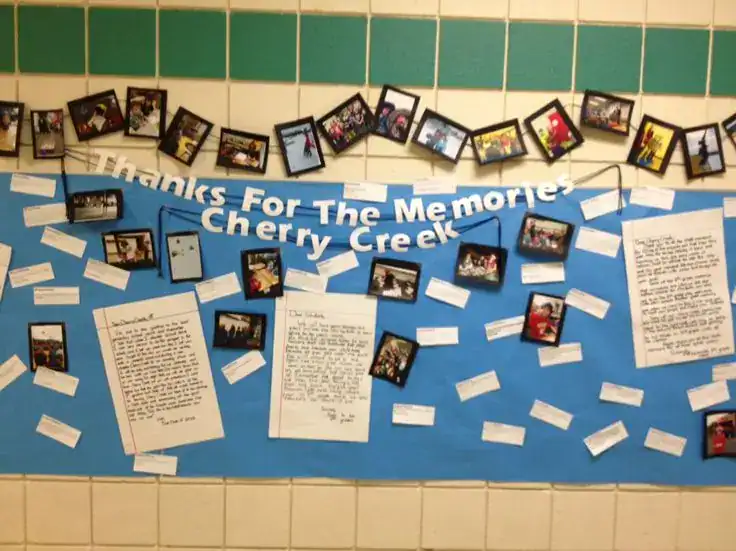 Year-in-review photo display board for an end-of-year school party with student photos and memories