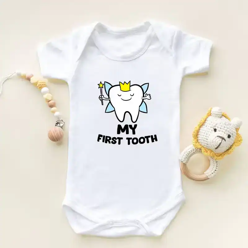 Baby bodysuit with "My First Tooth" design, perfect for first tooth celebrations.