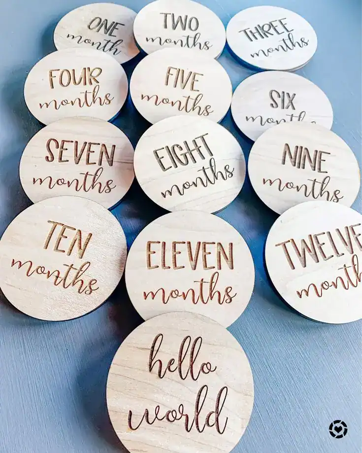 Baby's First Year milestone wooden tokens for first tooth celebration.