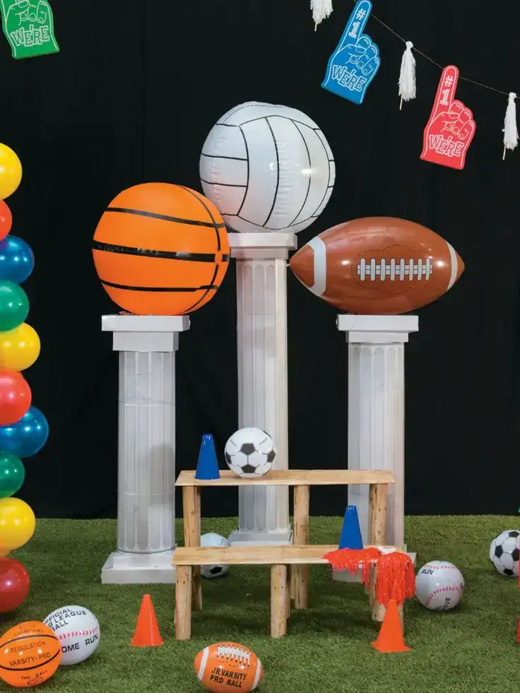 Sports tournament setup with colorful banners and team equipment for an end-of-year school party
