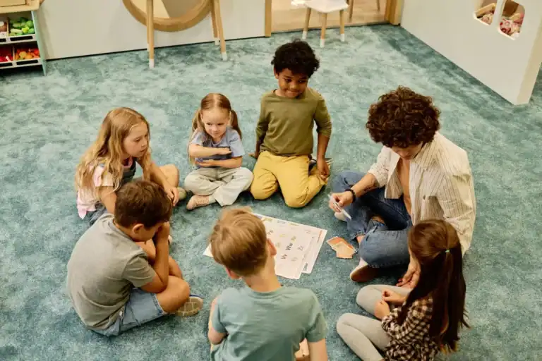 Children playing Simon Says game indoors.