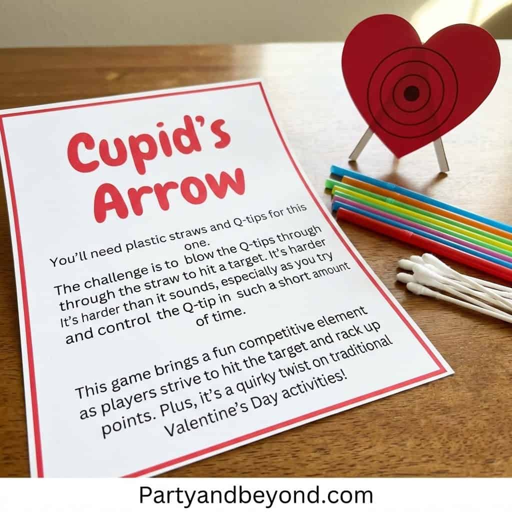 Valentine's Day Cupid's Arrow game with paper heart target and colorful arrows.