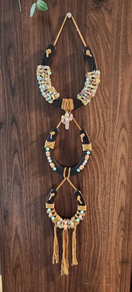 Colorful St. Patrick's Day themed hanging decoration with beads and tassels.