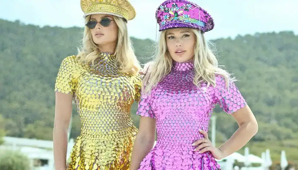 Elegant Mardi Gras costumes with sequins and vibrant colors.