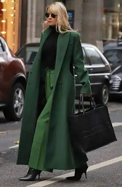 Stylish green coat and accessories for St. Patrick's Day celebration.