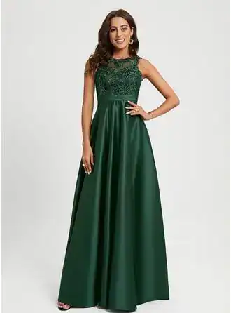 Green evening gown with lace bodice and flowing skirt, perfect for St. Patrick's Day celebrations.