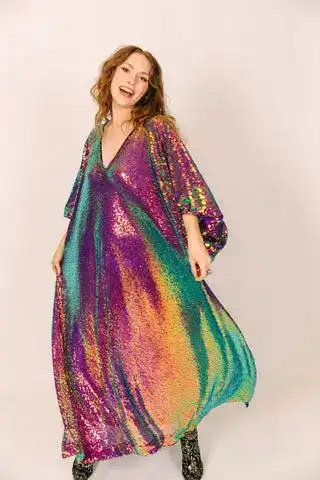Sequin dress with vibrant rainbow colors, perfect for Mardi Gras celebrations and party outfits.