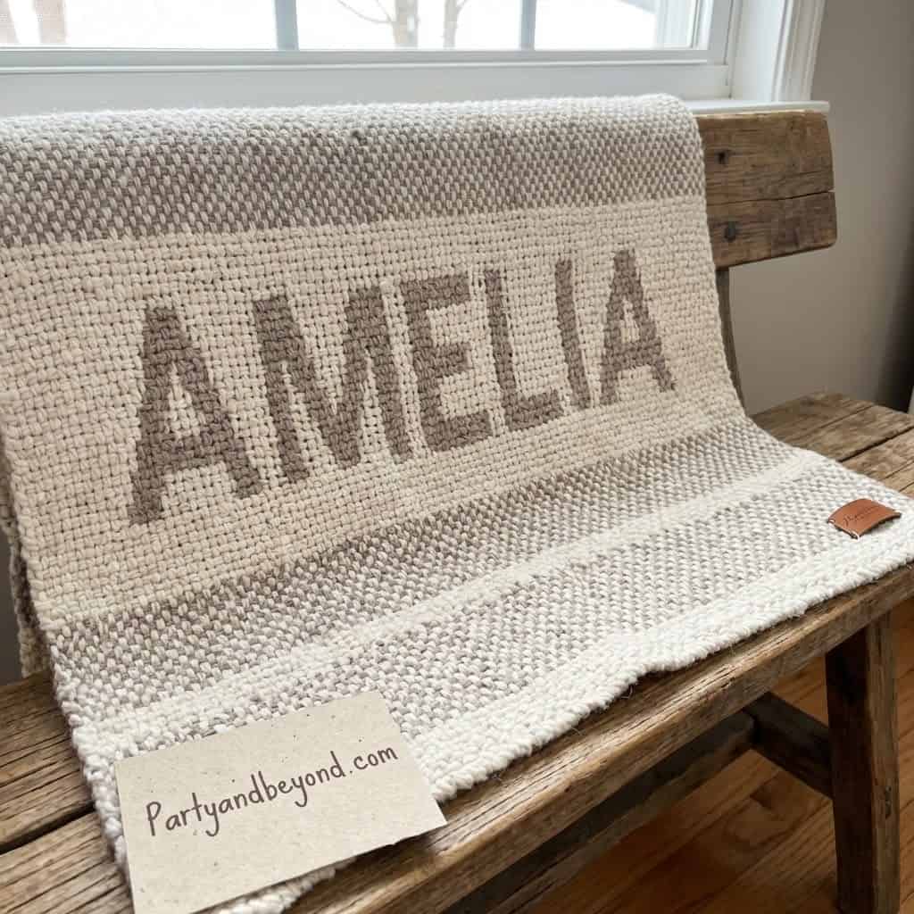 Personalized blanket with "Amelia" for Sweet 16 gift.