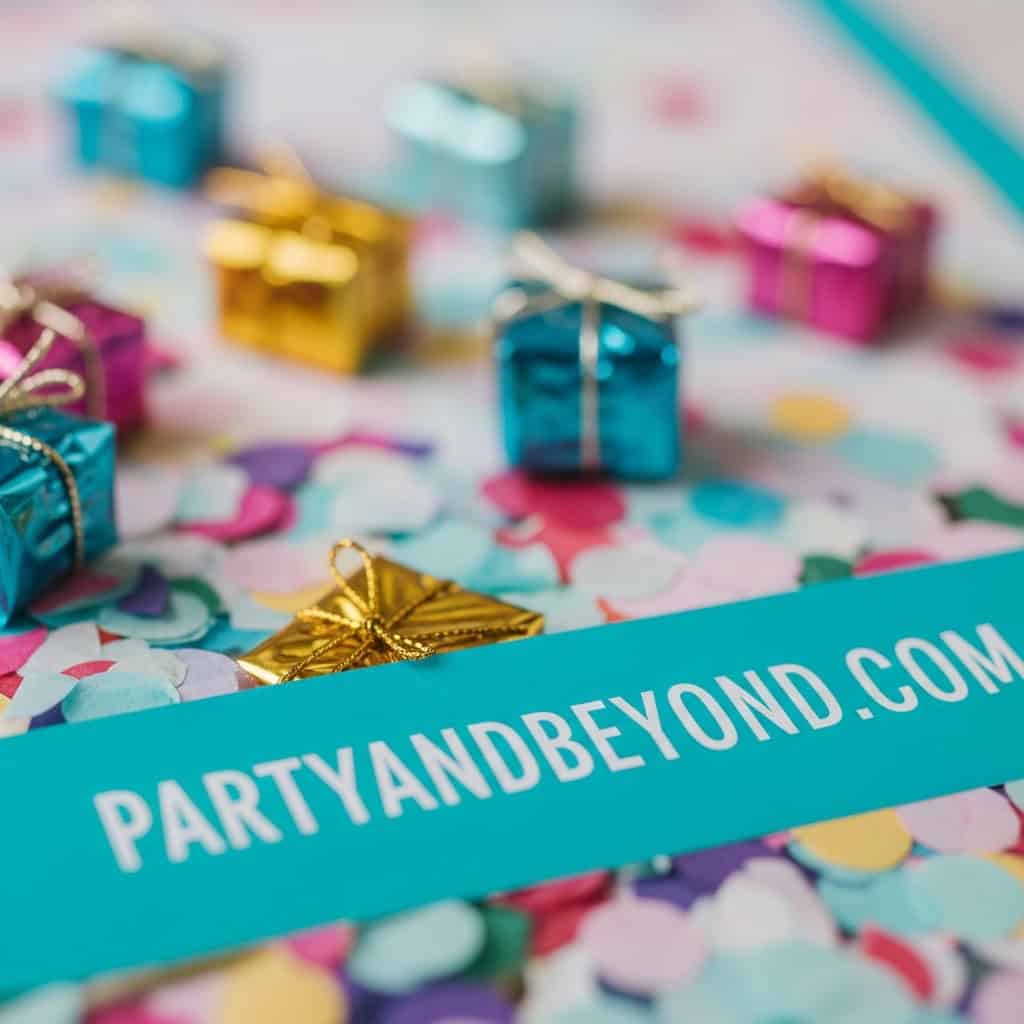 Colorful Father's Day gift ideas with small presents and confetti for kids to give dads.