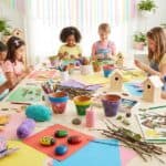 19 Spring Crafts for Kids Creative and Fun DIY Ideas Children engaging in creative spring craft activities at a party.