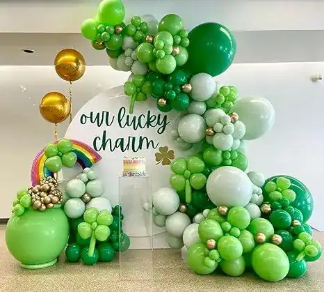 Colorful St. Patrick's Day balloon arrangement with green, white, and gold balloons.