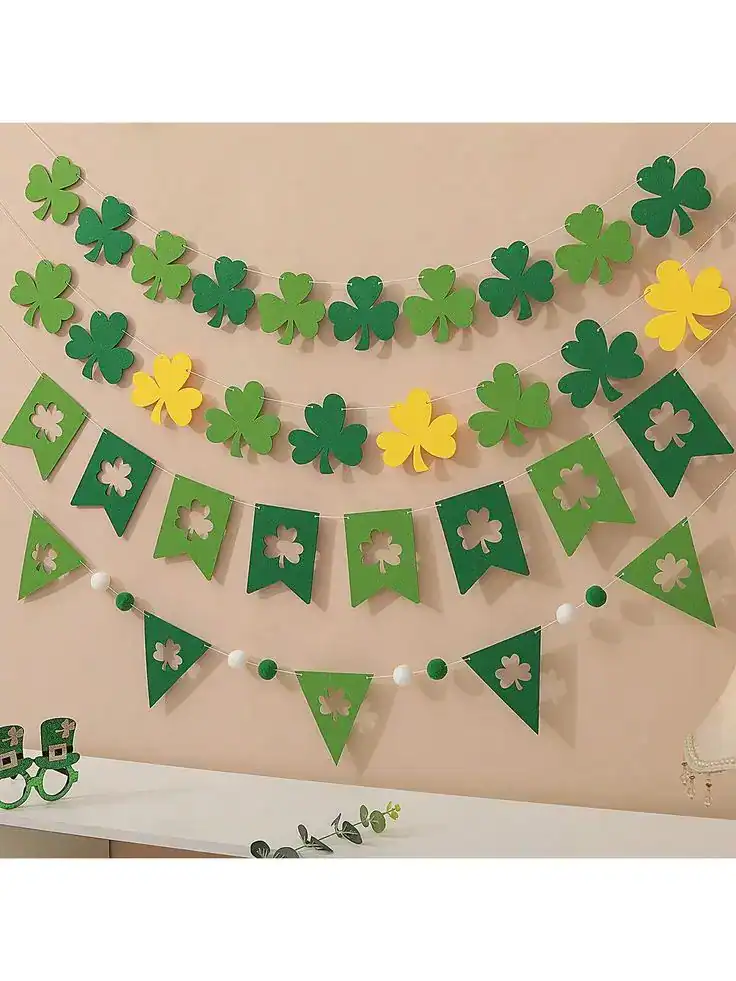 St. Patrick's Day shamrock garland with green and yellow decorations.