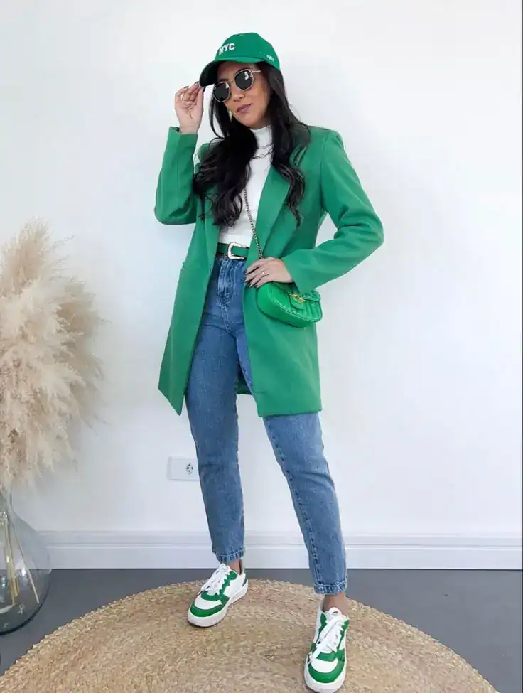 Stylish green blazer and casual jeans for St. Patrick's Day celebrations.