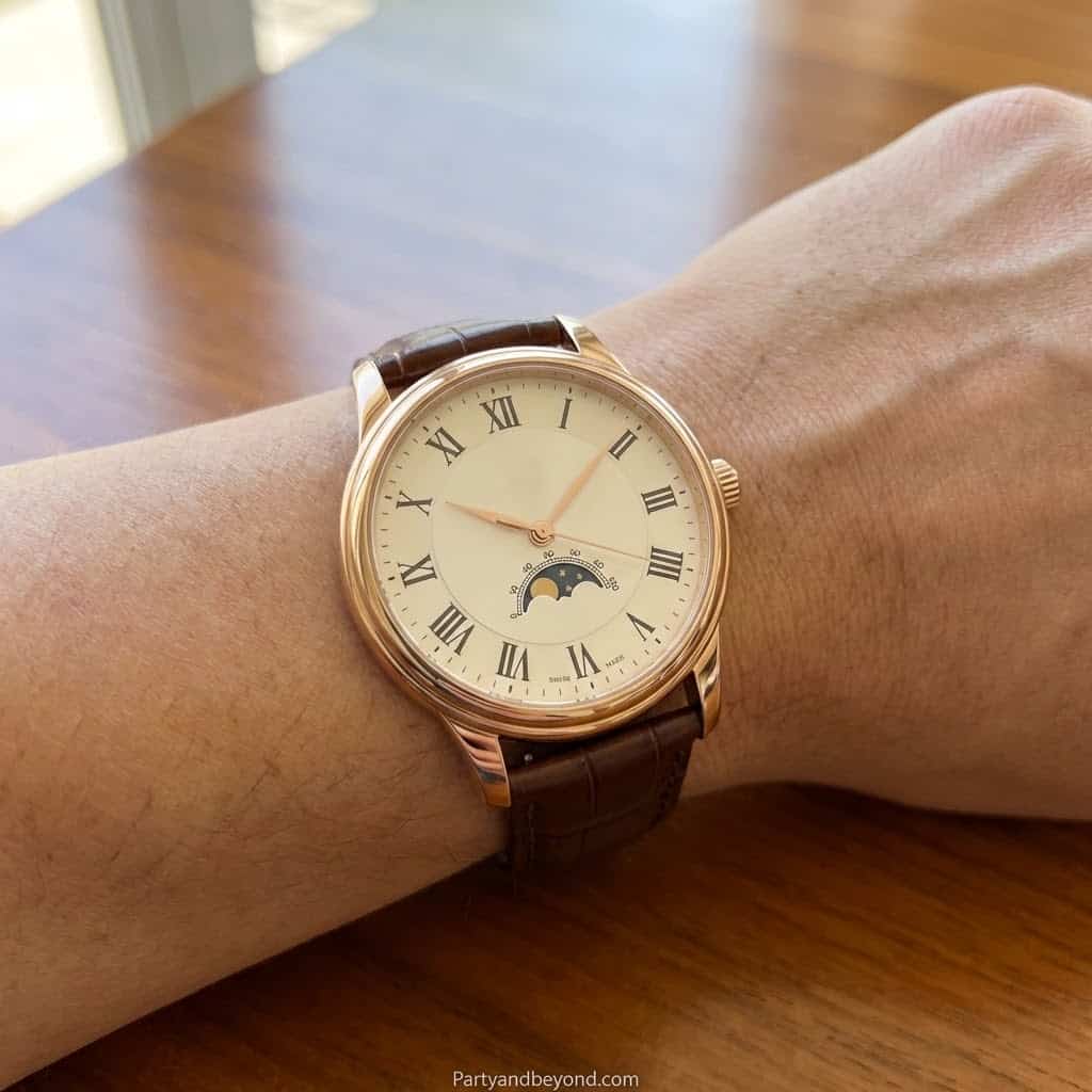 Elegant wristwatch with Roman numerals and moon phase, perfect for Mother's Day gift ideas 2026.
