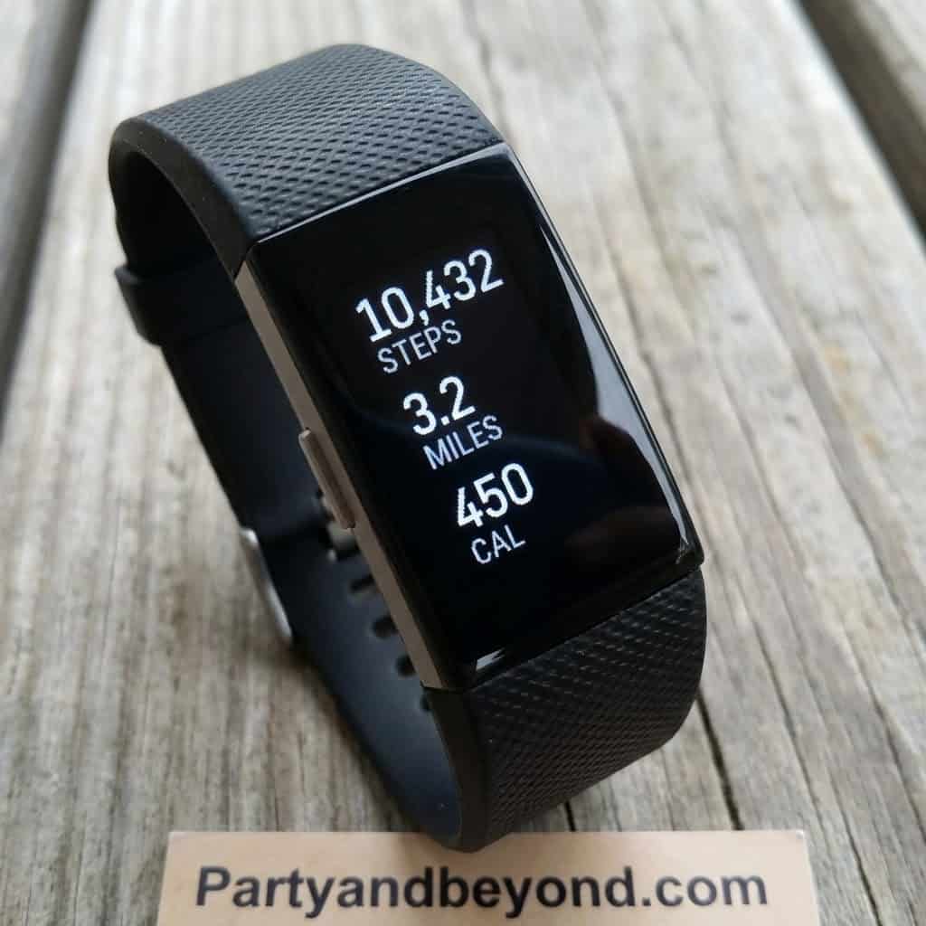 Fitness smartwatch displaying steps, miles, and calories for women’s health tracking.