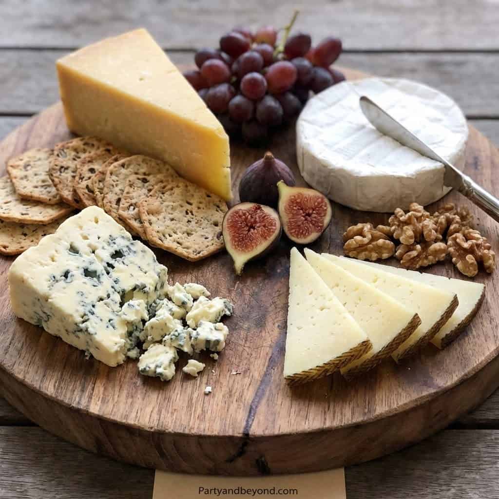Delicious cheese and fresh fruit assortment for easy party food ideas. Perfect for budget-friendly g.