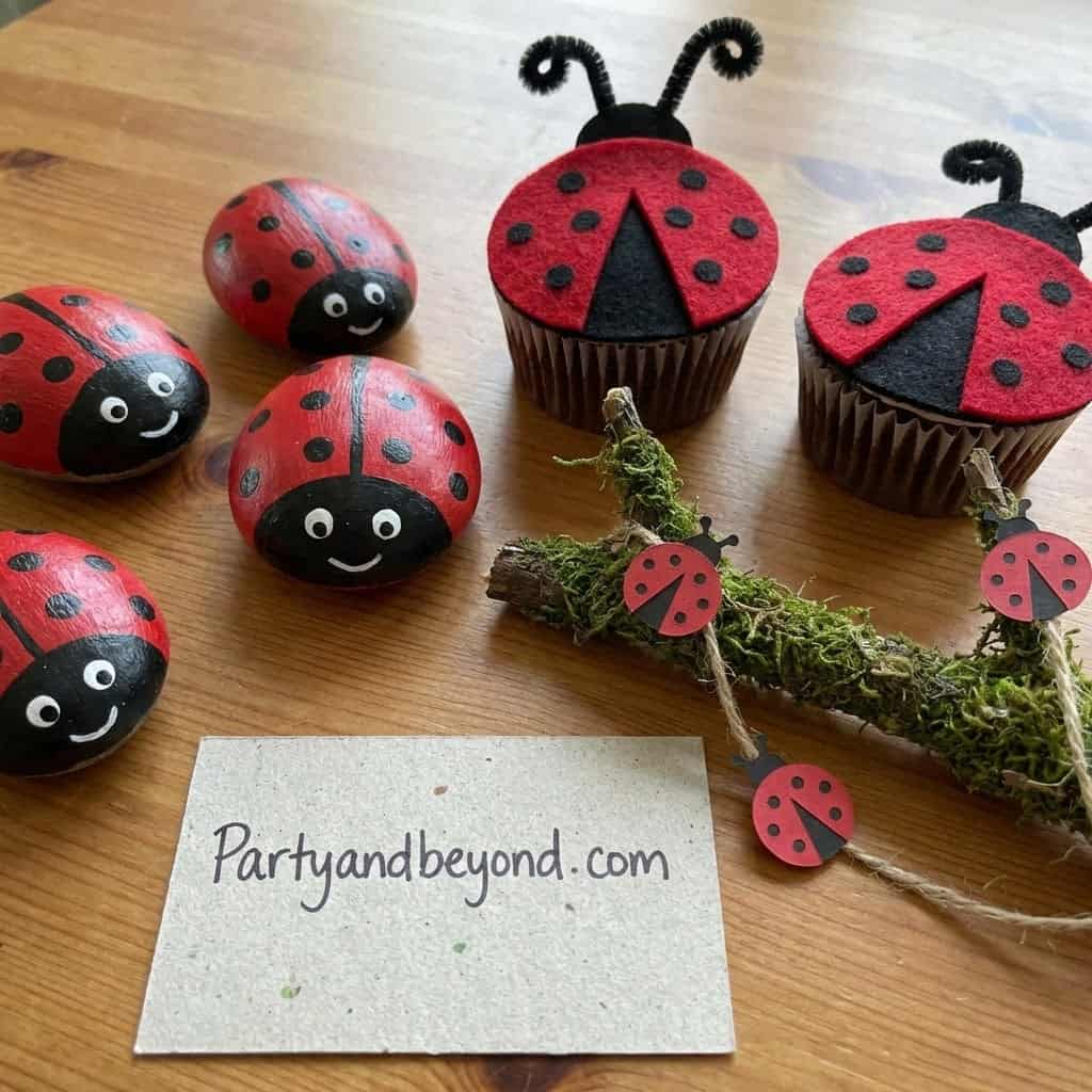 Ladybug-themed party decorations and cupcakes for a fun birthday celebration.