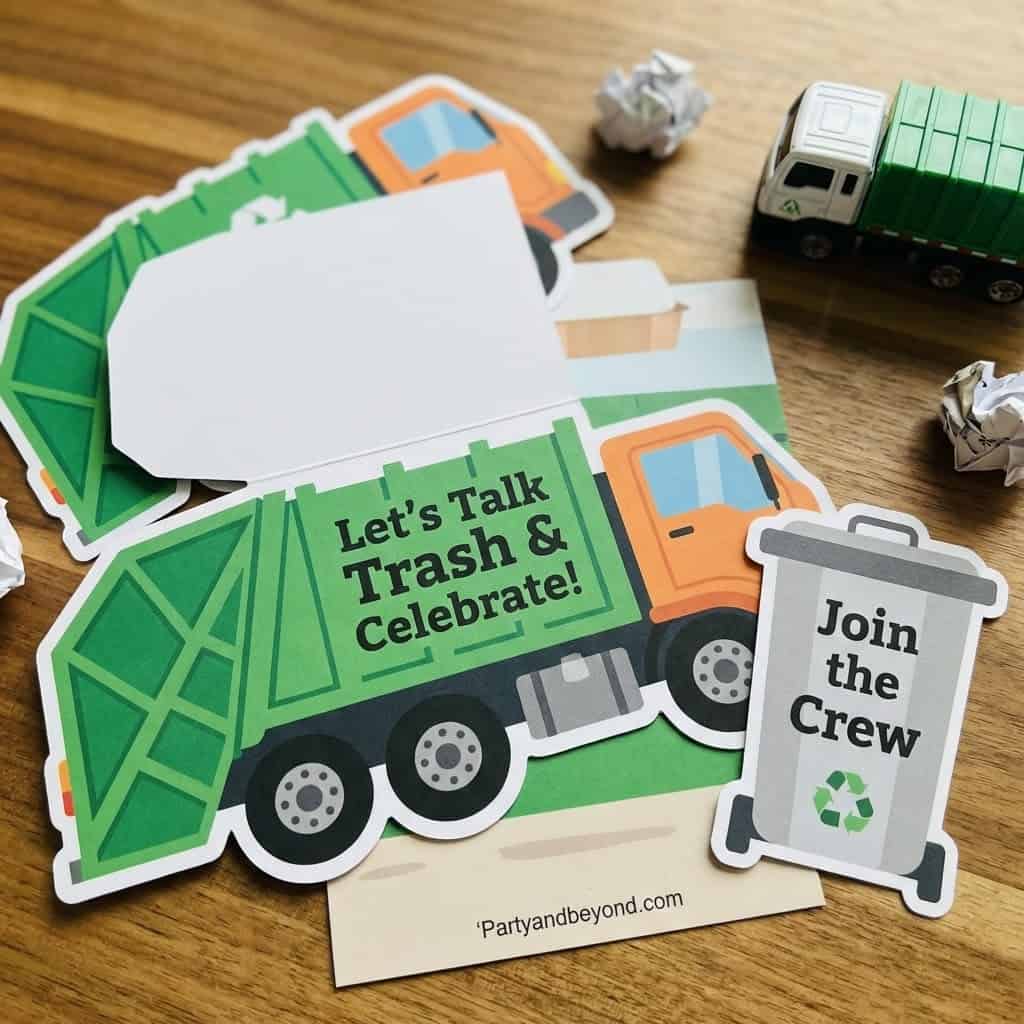 Trash truck themed birthday party signs and decorations for kids' celebration.
