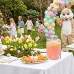18 Easter Party Ideas to Make Your Celebration Unforgettable Easter Bunny mascot with children at spring garden party with decorated table and colorful eggs.