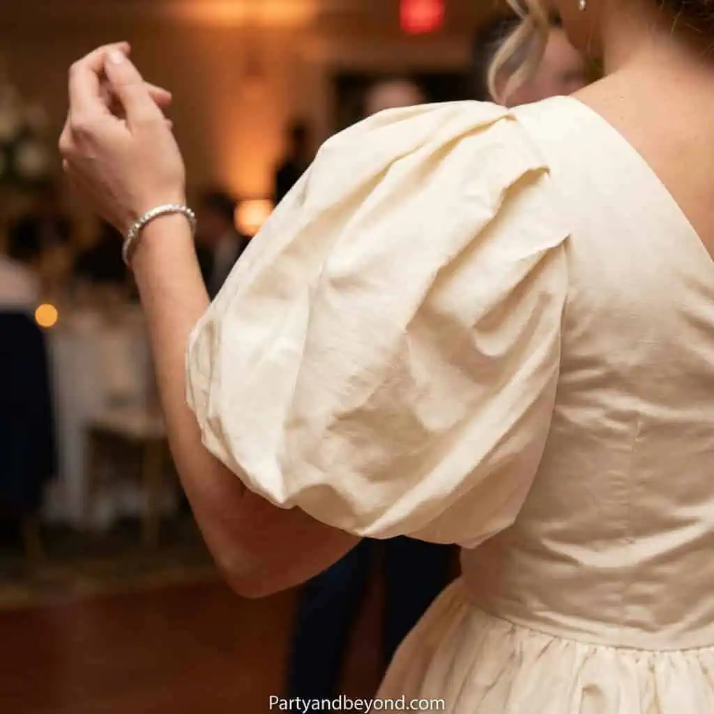 Elegant puff sleeve dress for a 16th birthday celebration. Perfect for making a stylish statement at.