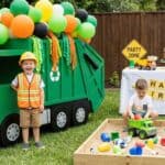 15 Trash Truck Birthday Party Ideas That Will Wow Your Little One Colorful trash truck-themed birthday party setup with balloons and toy trucks.