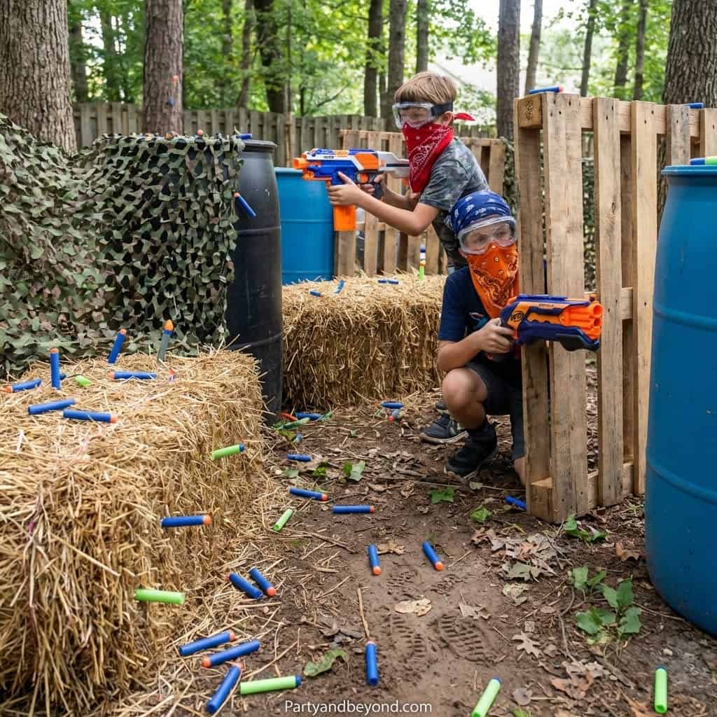 Kids playing laser tag in outdoor forest setting.