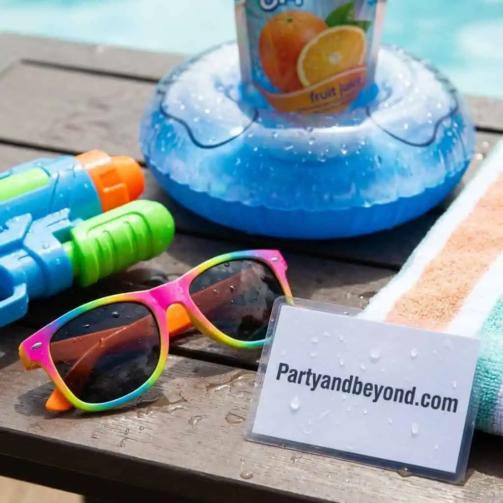 Colorful pool float and sunglasses for kids' pool party.