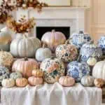 39 Elegant Pumpkin Painting Ideas for a Chic Fall Décor 2026 Colorful pumpkin collection with floral and patterned designs for festive fall celebrations.