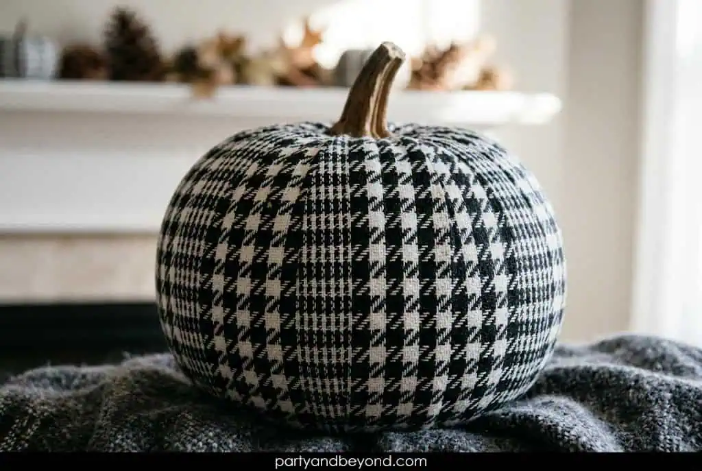 Black and cream pumpkin with houndstooth fabric-inspired pattern