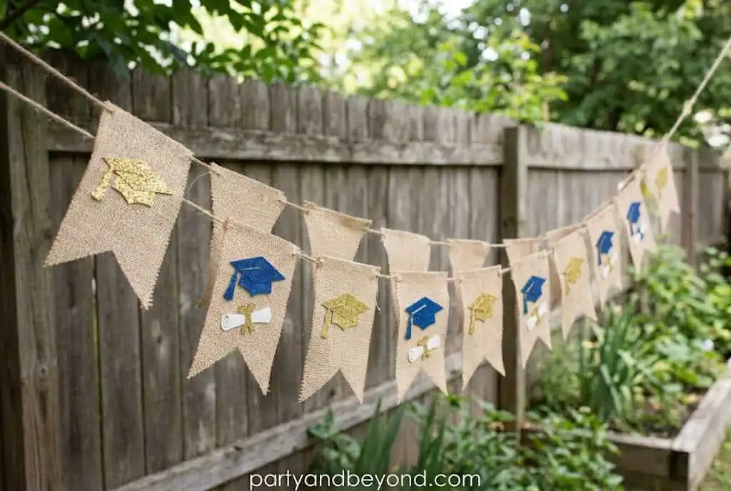 Hand-painted kraft paper graduation banner with school colors and custom lettering