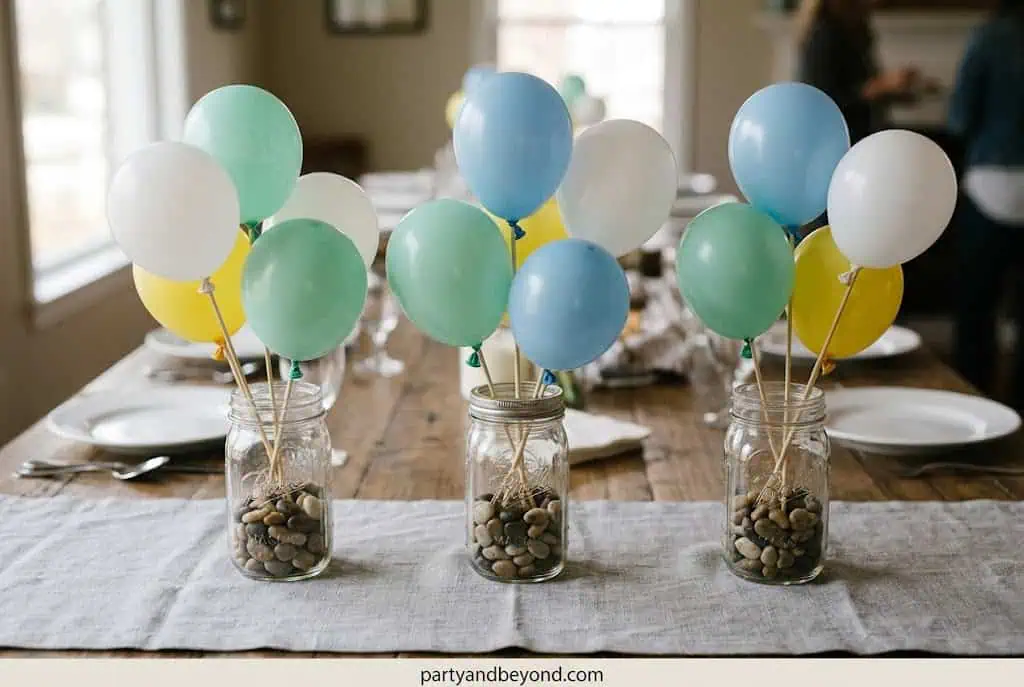 Mason jar balloon centerpieces with patriotic balloons for 4th of July table decor