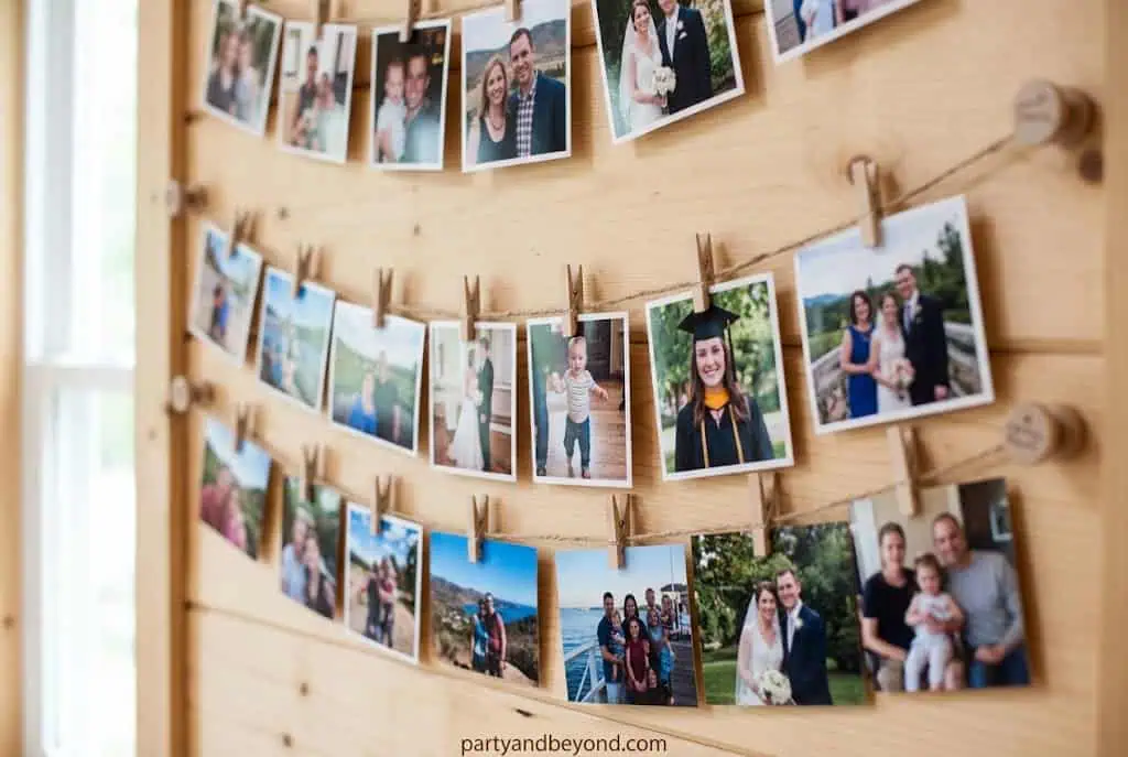 : Hanging graduation photo timeline display showing childhood to senior year picture